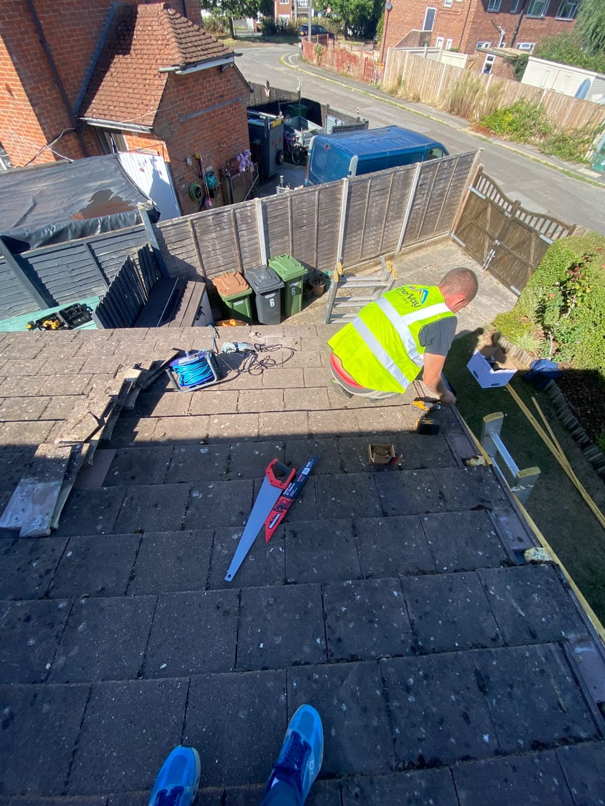 Roofer working on a slate roof